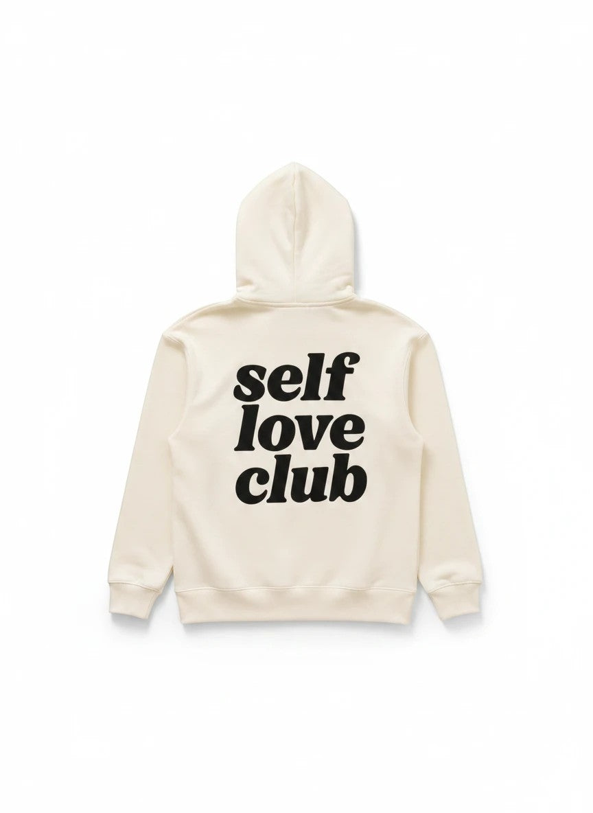 Sudadera beige con capucha de Gifting.mx con el texto Self Love Club en negro en la espalda
