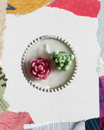Vela redonda con flores