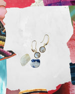 Aretes con charm de estrella