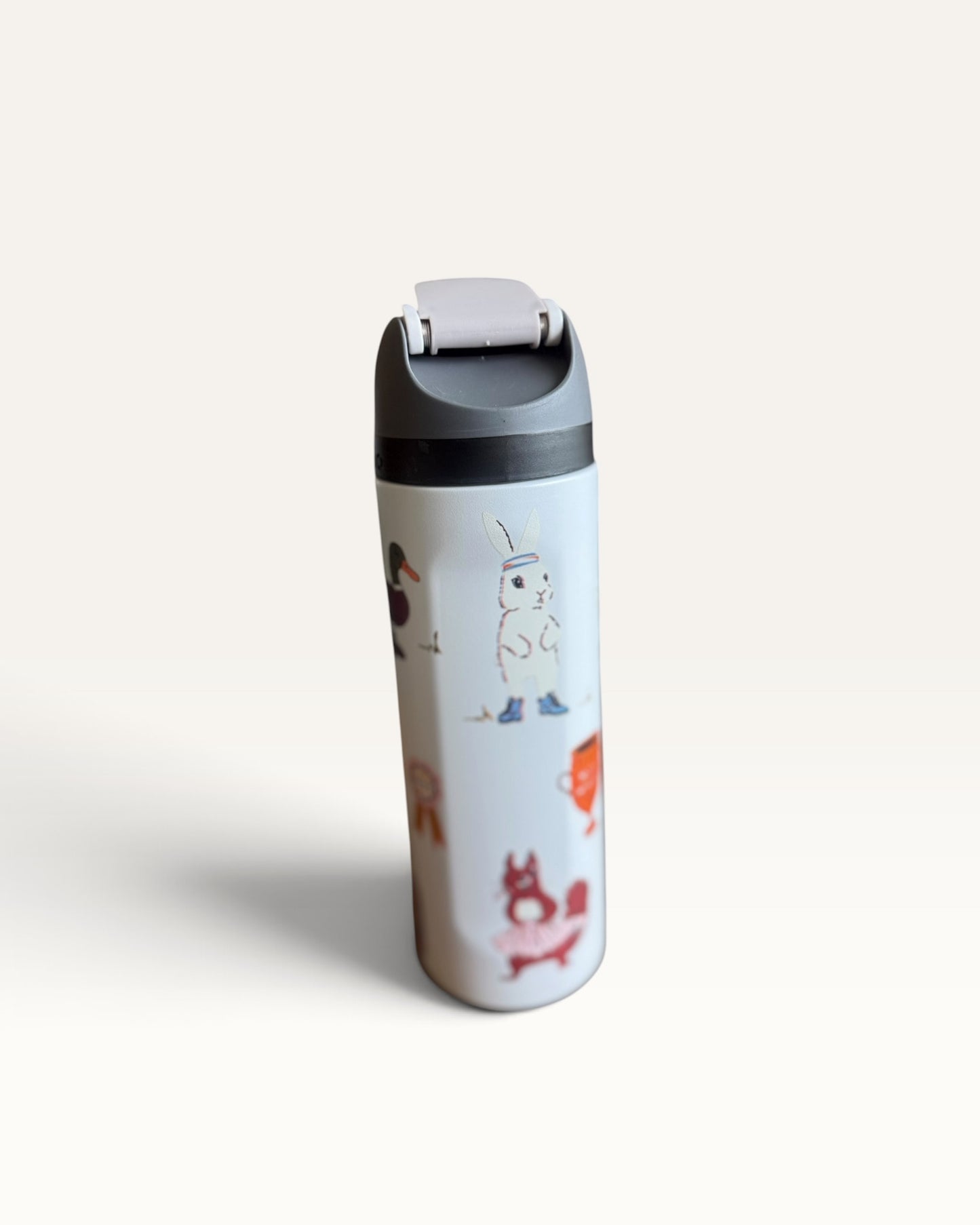 TERMO 24 OZ  BLANCO CON STICKERS