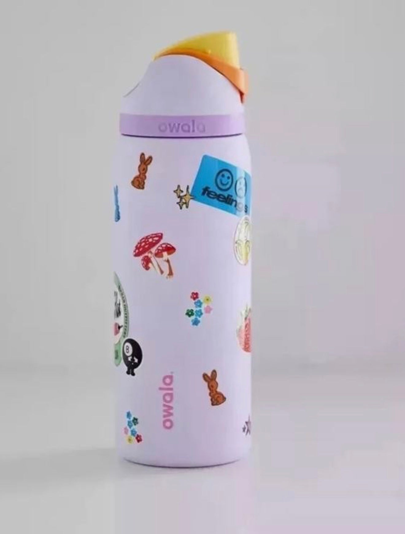 Termo morado con stickers 24 OZ